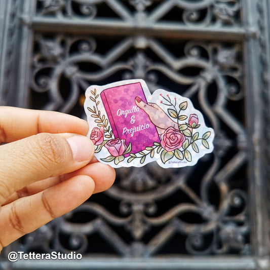 📖 Sticker Literario – Mano Sosteniendo Orgullo y Prejuicio de Jane Austen